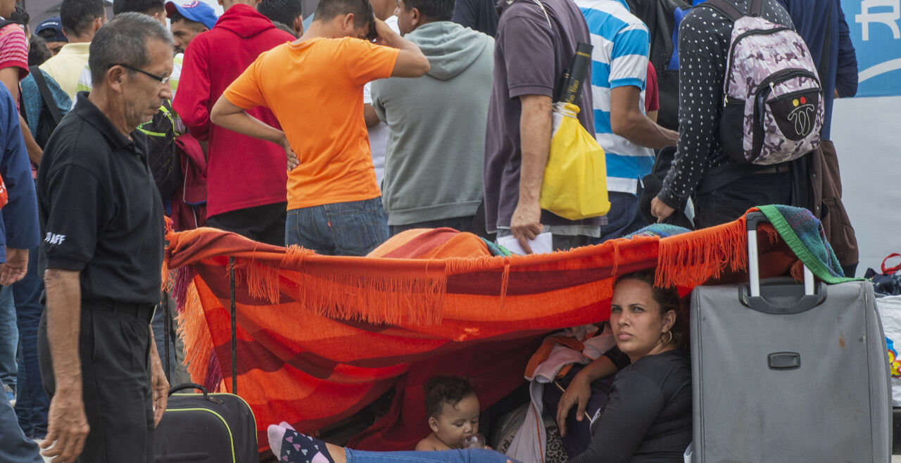 Lateinamerika Flüchtlinge - © Foto: APA / AFP / Cris Bouroncle